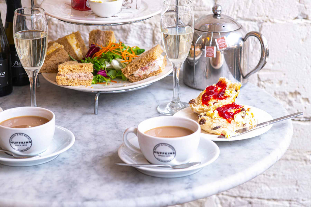 Afternoon tea with scones, prosecco and pot of tea