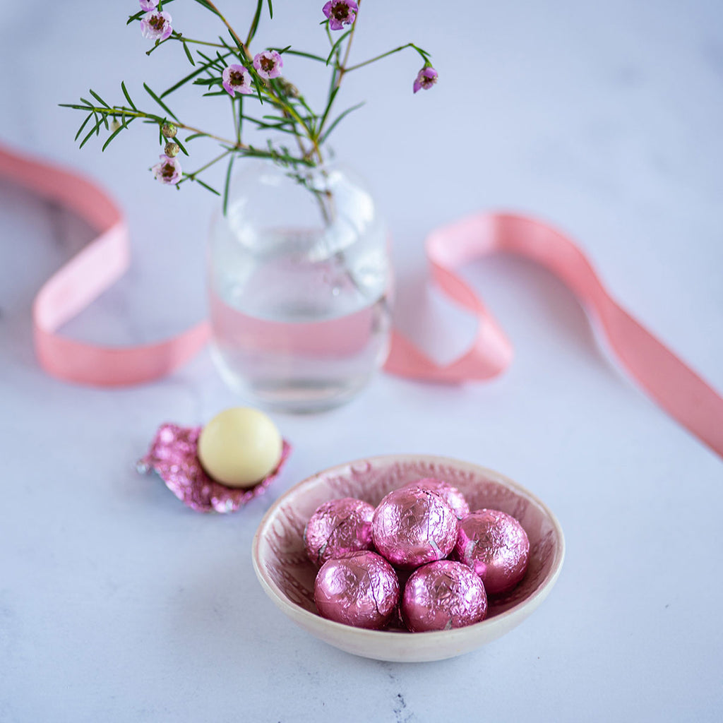 Luxury White Chocolate Raspberry & Champagne Truffle Balls wrapped in pink foil