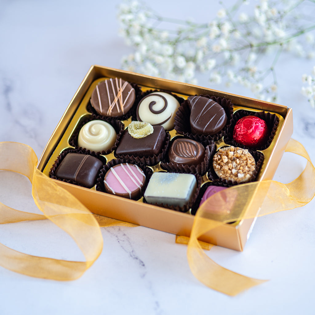Luxury Selection of Chocolates in an open gold box