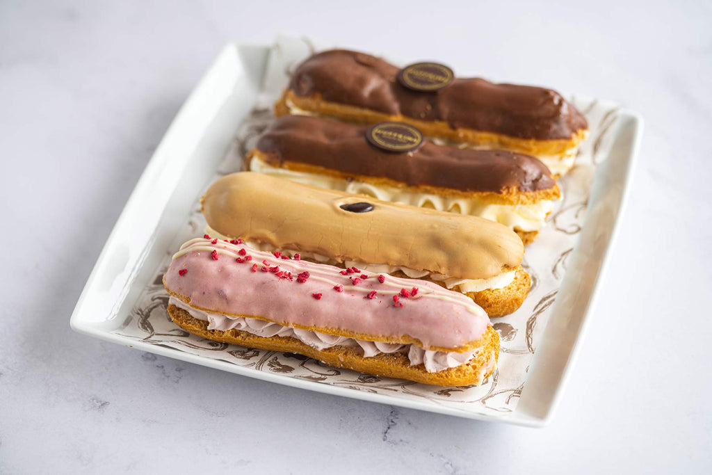 Fresh cream eclairs selection from Huffkins Catering