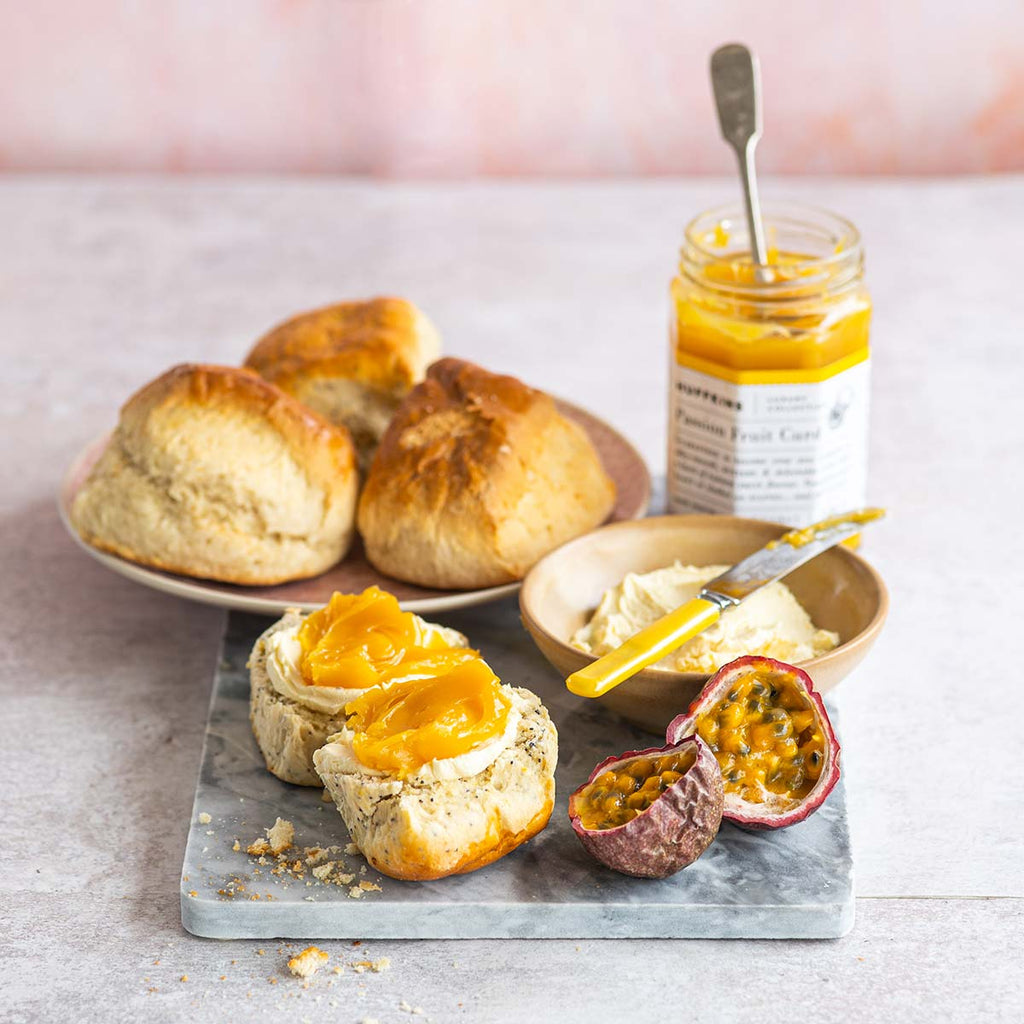 Lemon & poppyseed scones with passionfruit curd & clotted cream